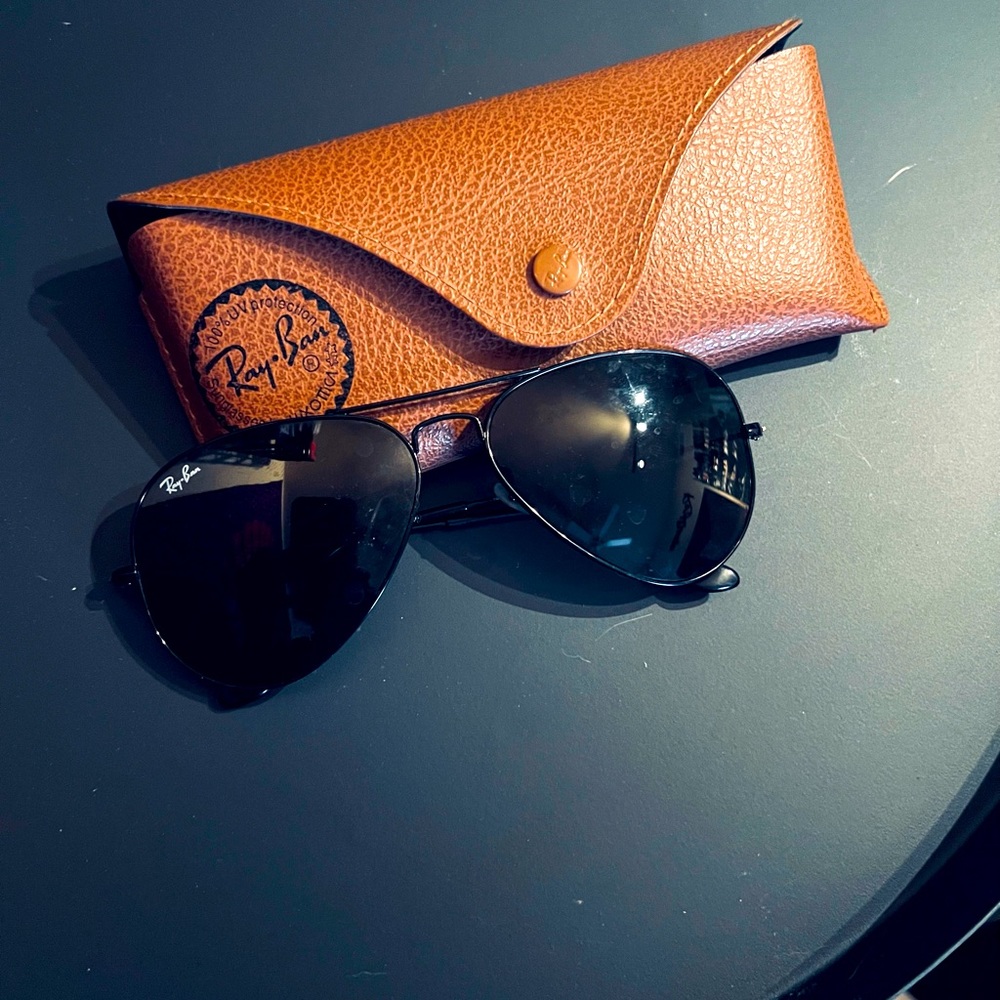 Rarely worn black adult ran ban Avaitors. Comes with case.